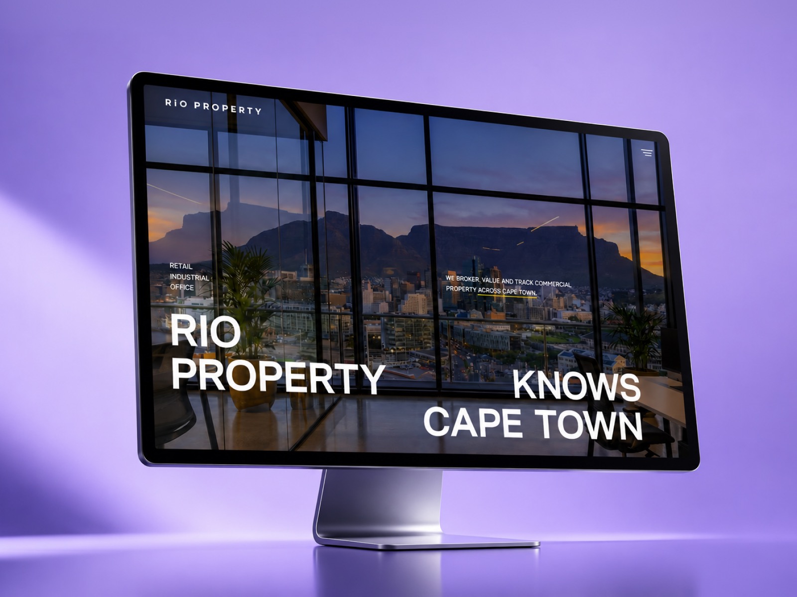 Rio Property homepage displayed on a desktop monitor, showing the full hero layout